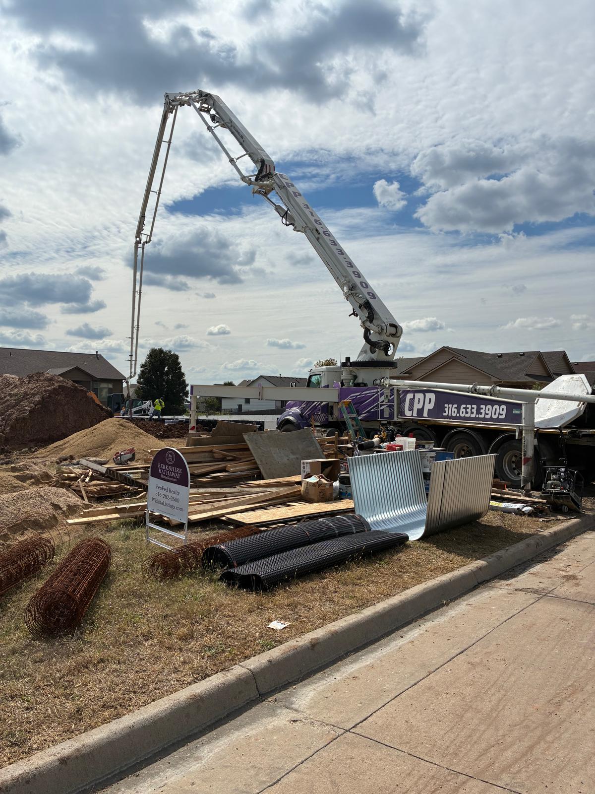 Crane on concrete job site